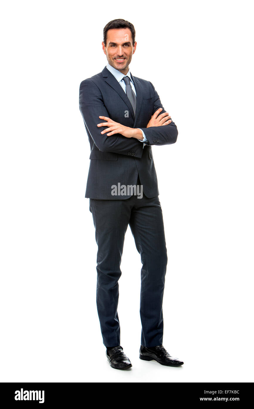 Full length portrait of a smiling businessman looking at camera with crossed arms Stock Photo