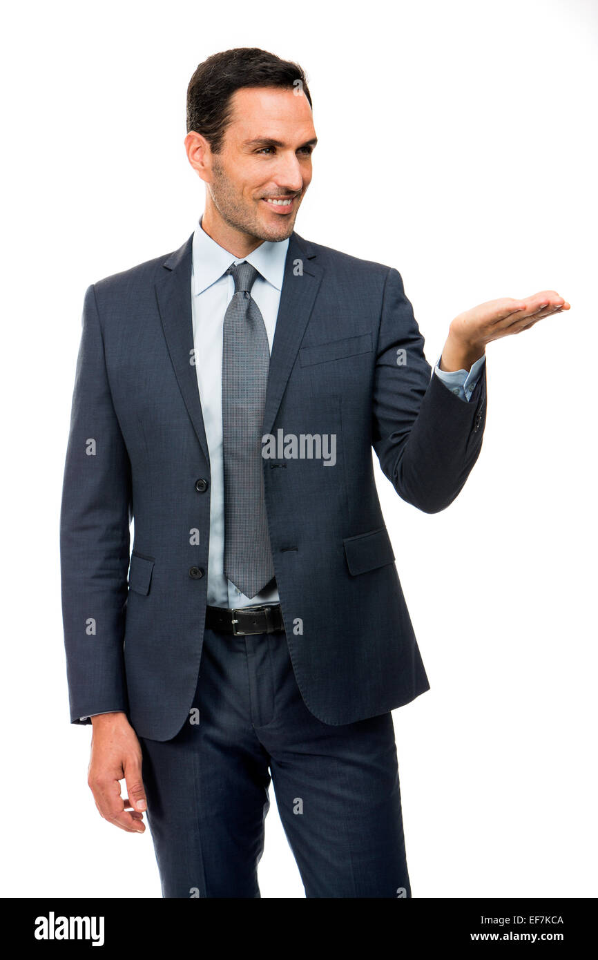 Half length  portrait of a smiling businessman in suit with lifted arm Stock Photo