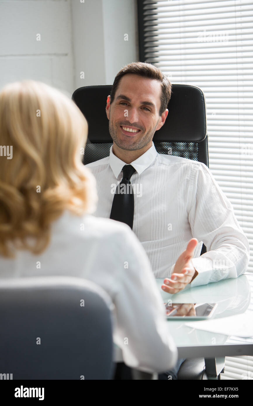Two businesspeple having a meeting in the office Stock Photo - Alamy