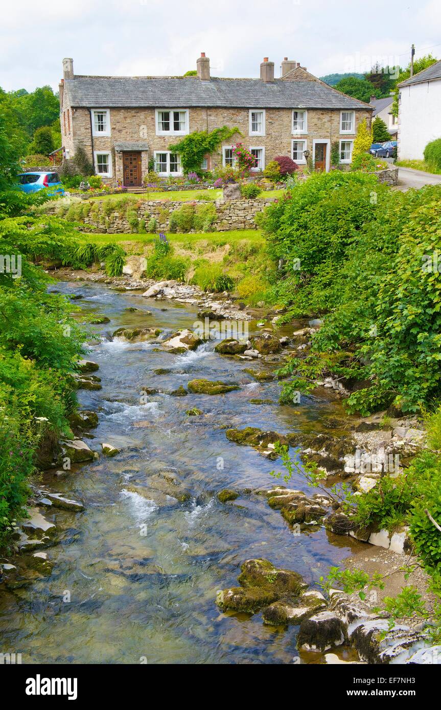 Cottages above the river Cald Beck, Calbeck Cumbria England UK. Stock Photo