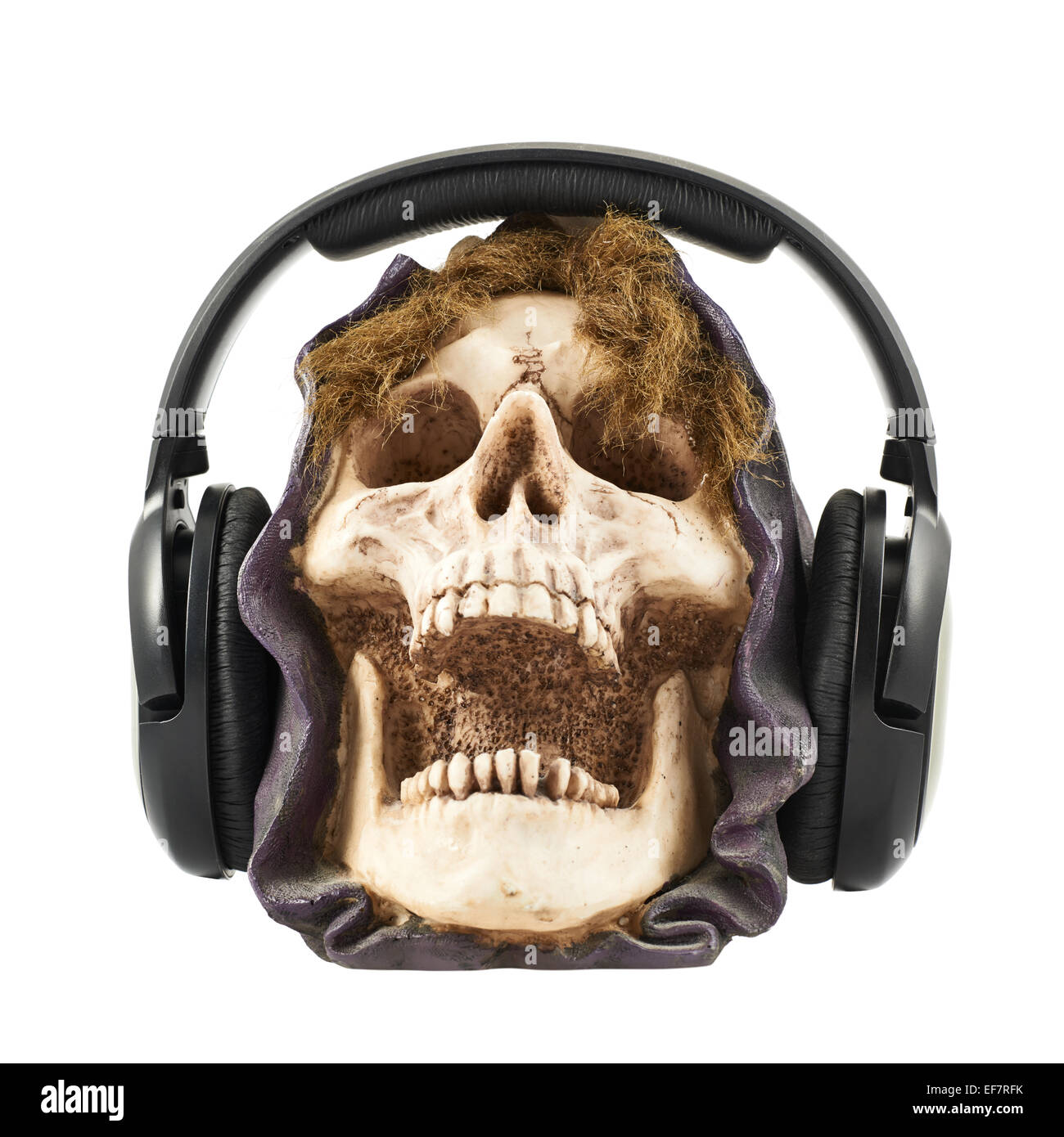 Headphones put on a ceramic skull head Stock Photo Alamy