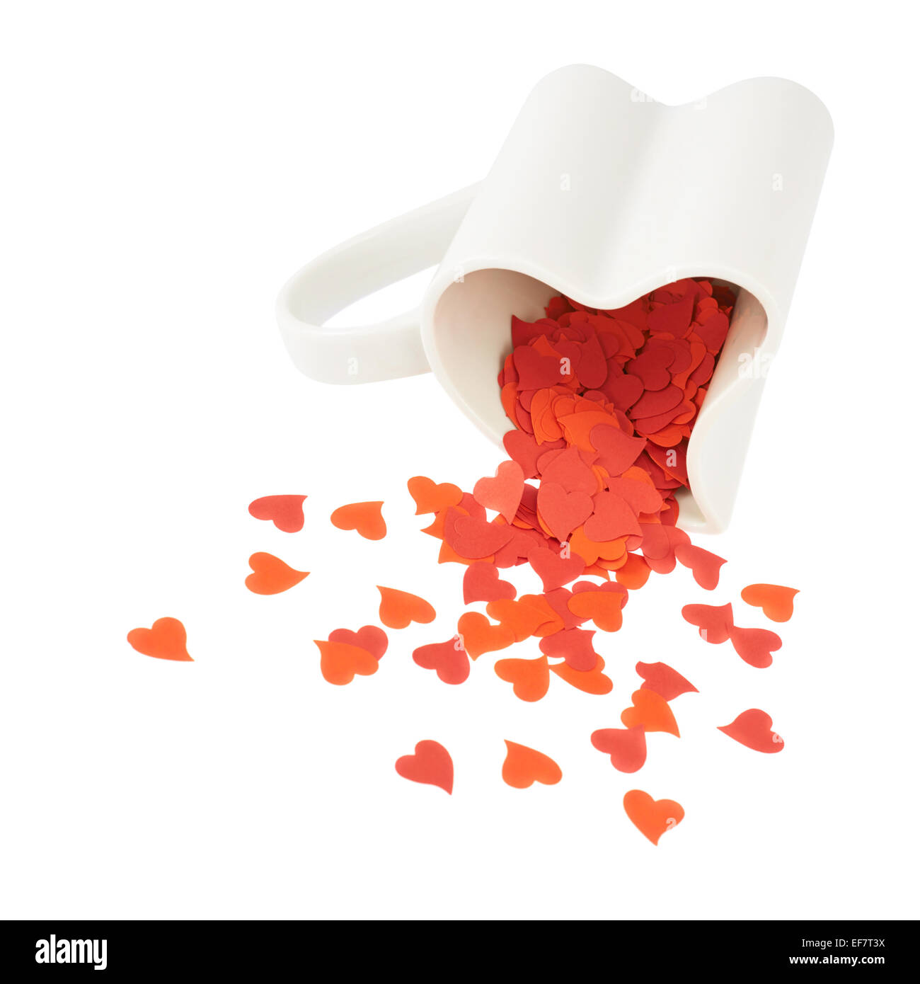 Heart confetti falling out of the cup Stock Photo Alamy