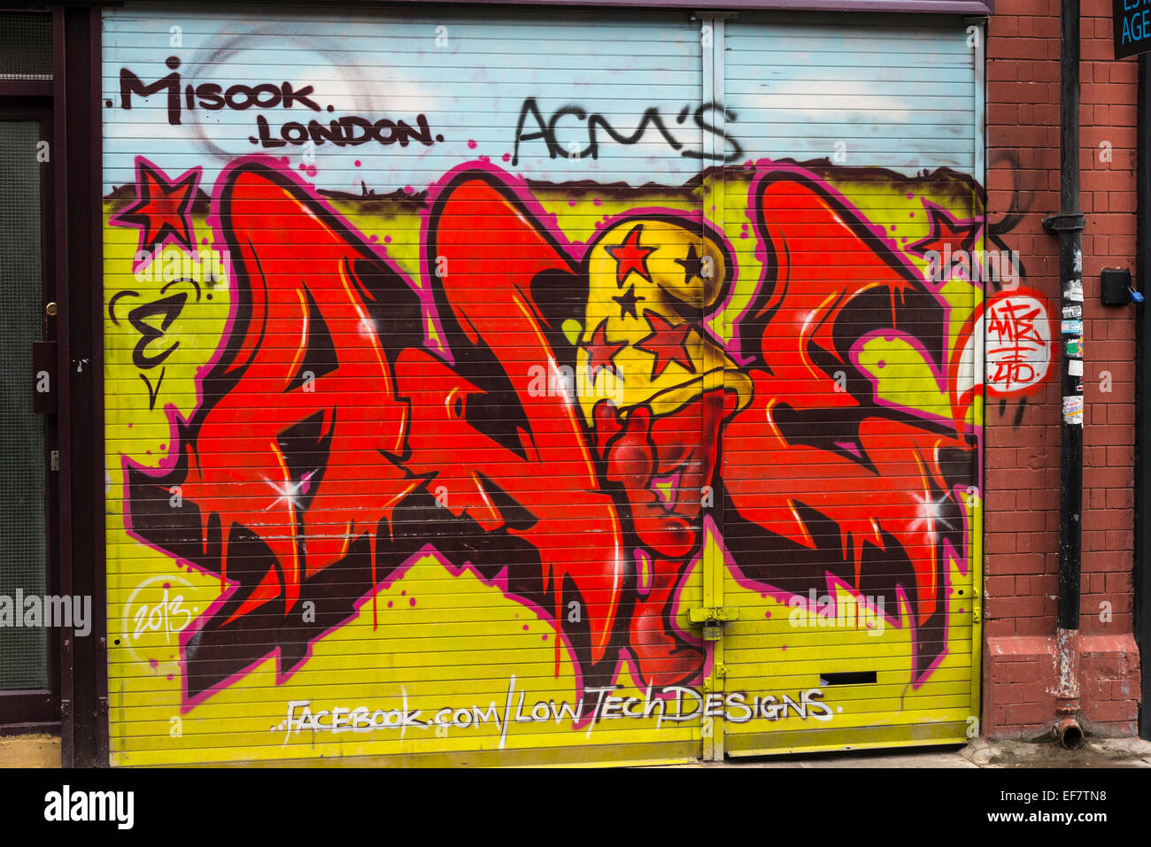 Graffiti street art in the Brick Lane area of London, England. - EDITORIAL USE ONLY Stock Photo