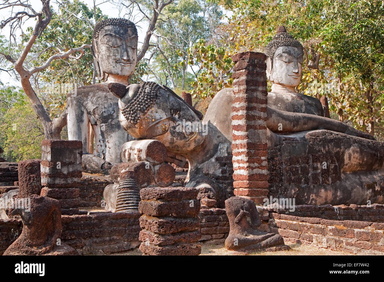 Statue of Reclining Buddha inside the Kamphaeng Phet Historical Park, Northern Thailand Stock Photo