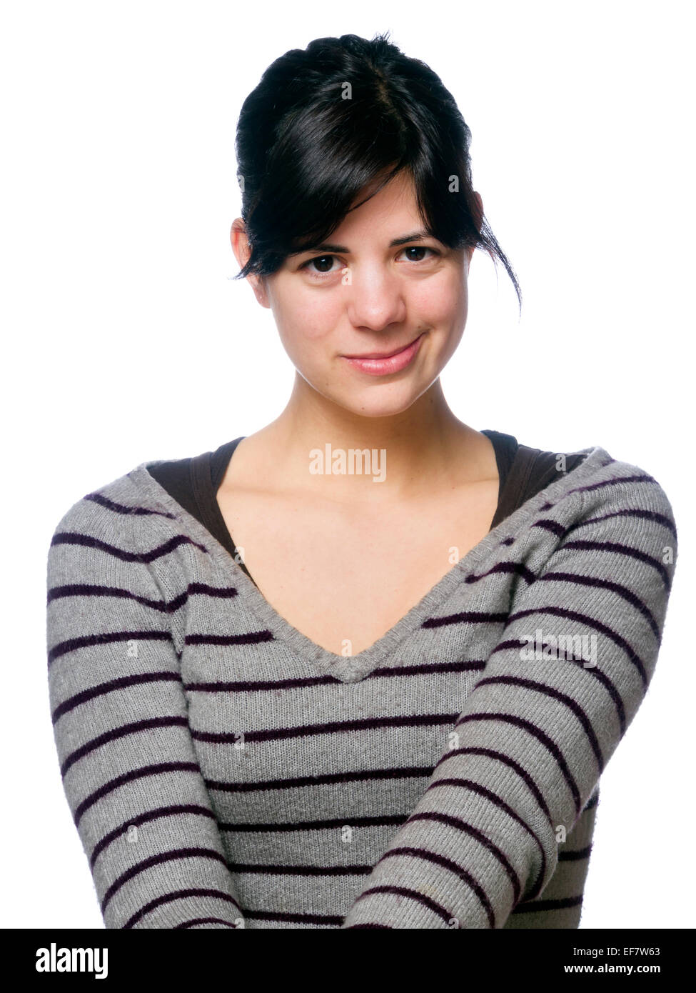 Young woman with quirky smile Stock Photo