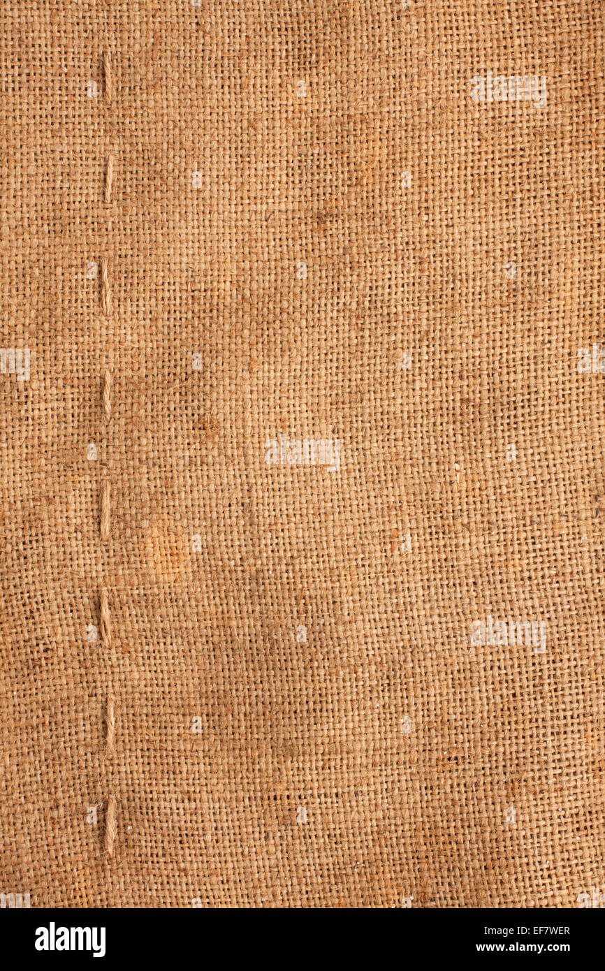 Line, guy-sutures on  Burlap ,sacking, it is possible to use as a background Stock Photo