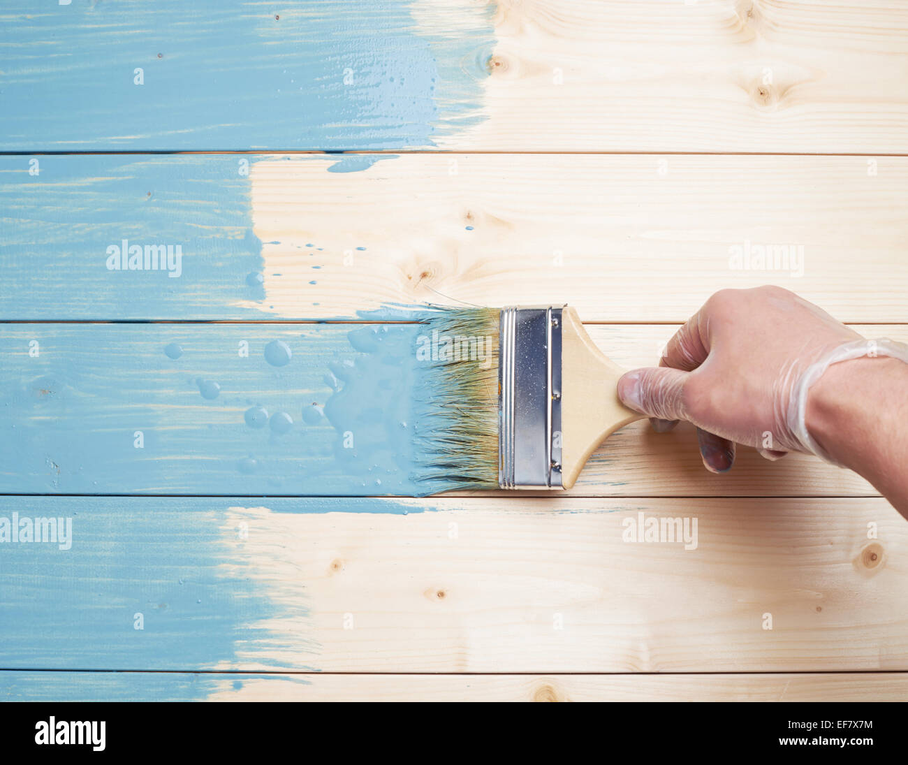 Process of painting wooden boards Stock Photo Alamy