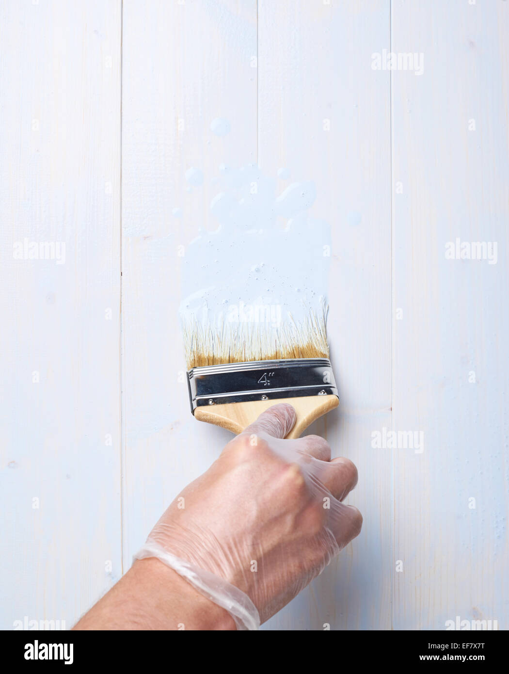 Process of painting wooden boards Stock Photo Alamy