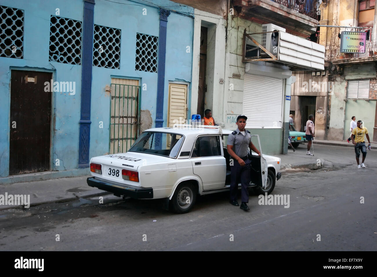 Policeman and police car in Havana, Cuba Stock Photo Alamy