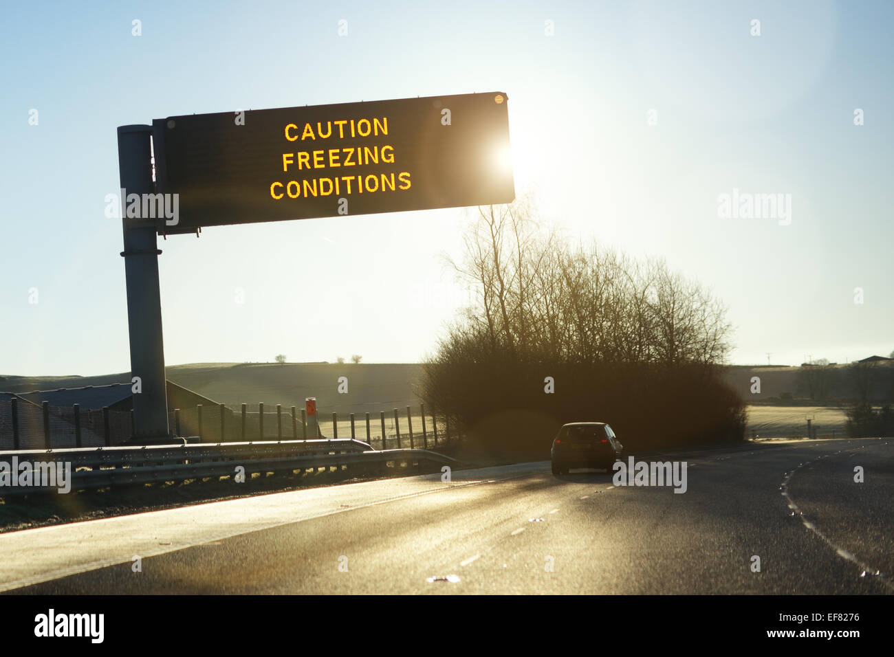 Motorway gantry sign in winter Stock Photo