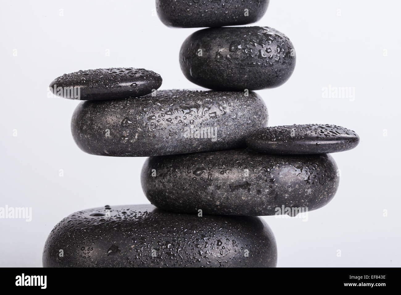 Spa stones isolated on white Stock Photo - Alamy