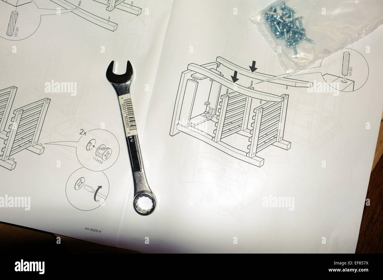 Ikea Furniture Assembly Instructions With A Spanner On Top Of Them
