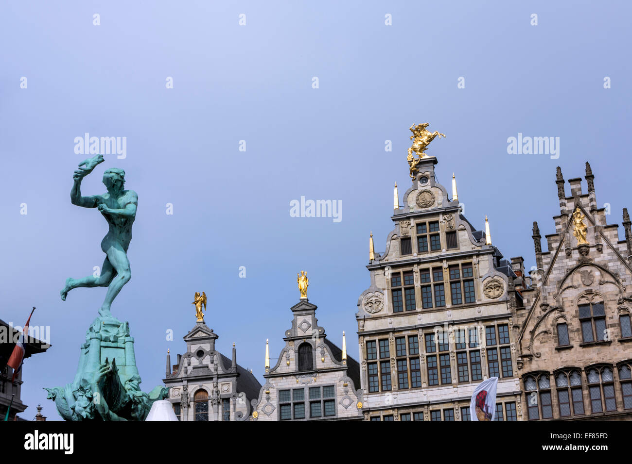 Statue of Brabo and the giant's hand with 16th-century Guildhouses at the Grote Markt. Antwerp, Stock Photo