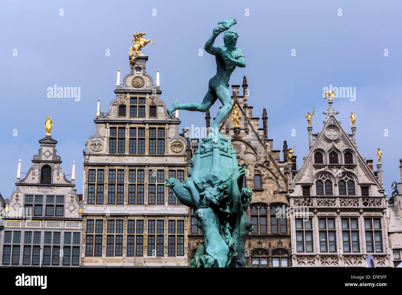 Statue of Brabo and the giant's hand with 16th-century Guildhouses at the Grote Markt. Antwerp, Stock Photo