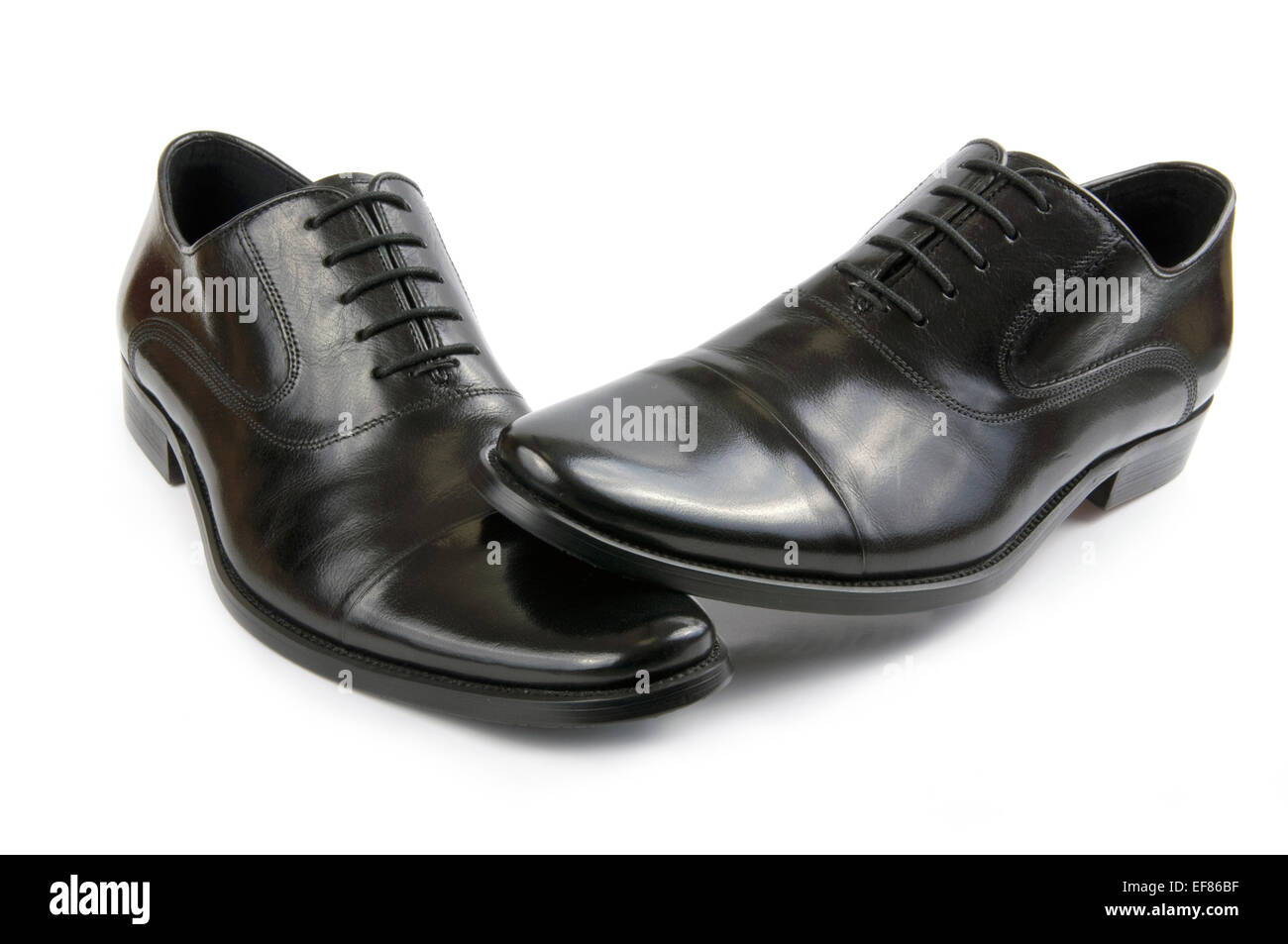 Pair of black leather mens shoes isolated on a white background Stock Photo