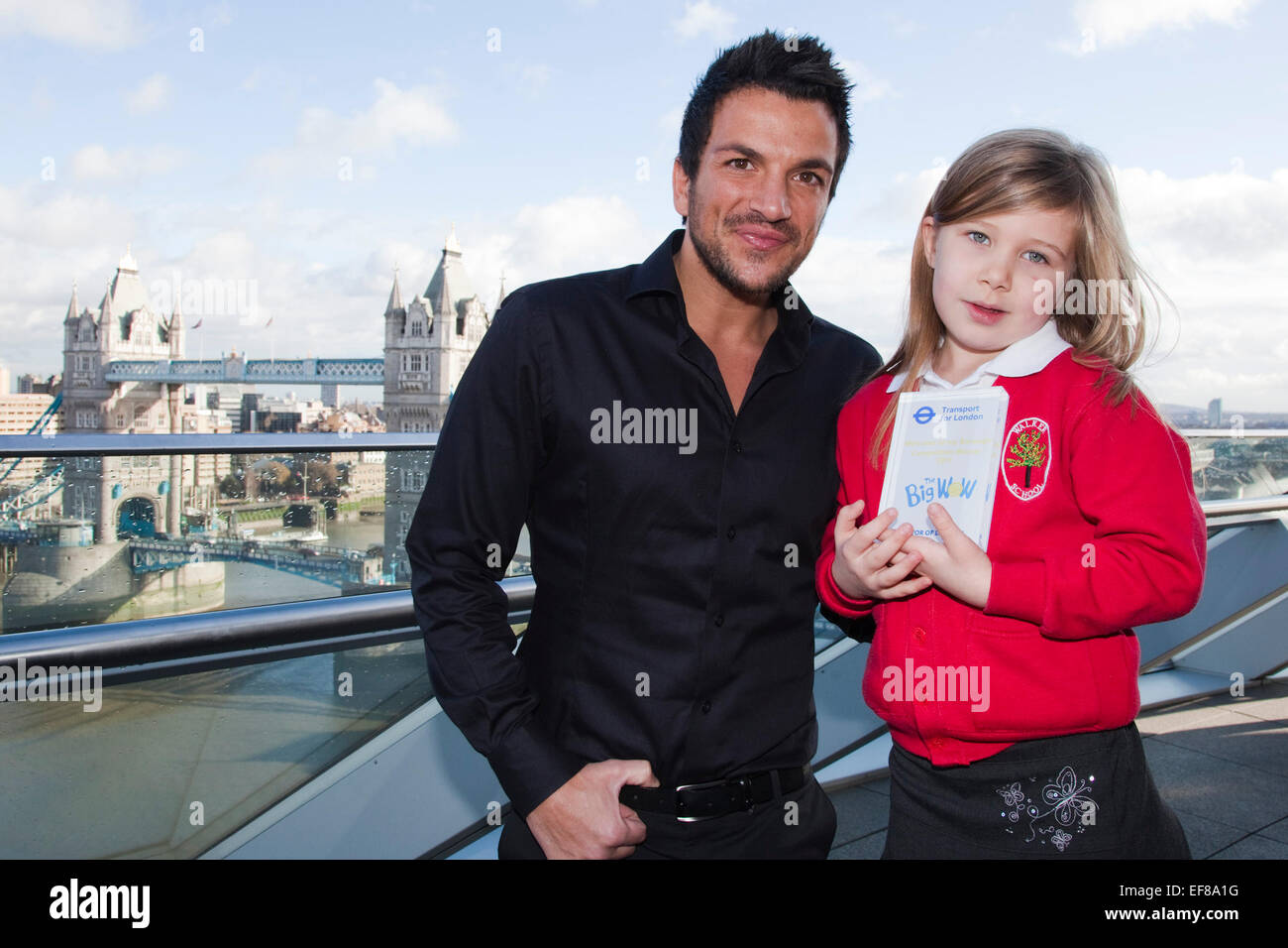 Peter Andre with Scarlett Kavenagh, 5, from Walker Primary School in
