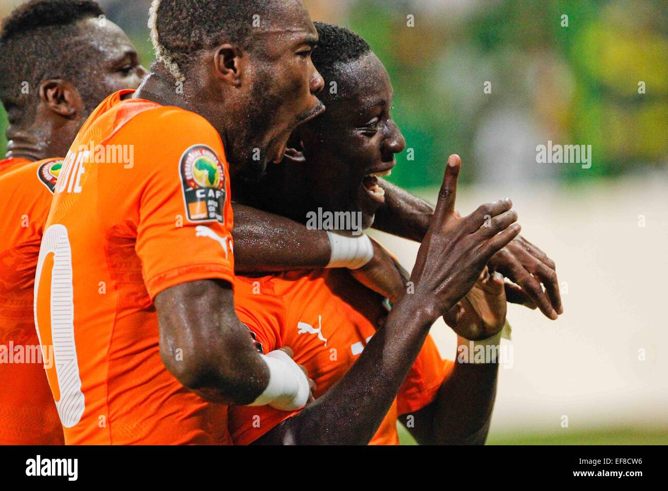 Malabo, Equatorial Guinea. 28th Jan, 2015. Max Alain Gradel (R) of Cote d'Ivoire celebrates his goal during their group match of Africa Cup of Nations against Cameroon at the Stadium of Malabo, Equatorial Guinea, Jan. 28, 2015. Cote d'Ivoire won 1-0. Credit:  Li Jing/Xinhua/Alamy Live News Stock Photo