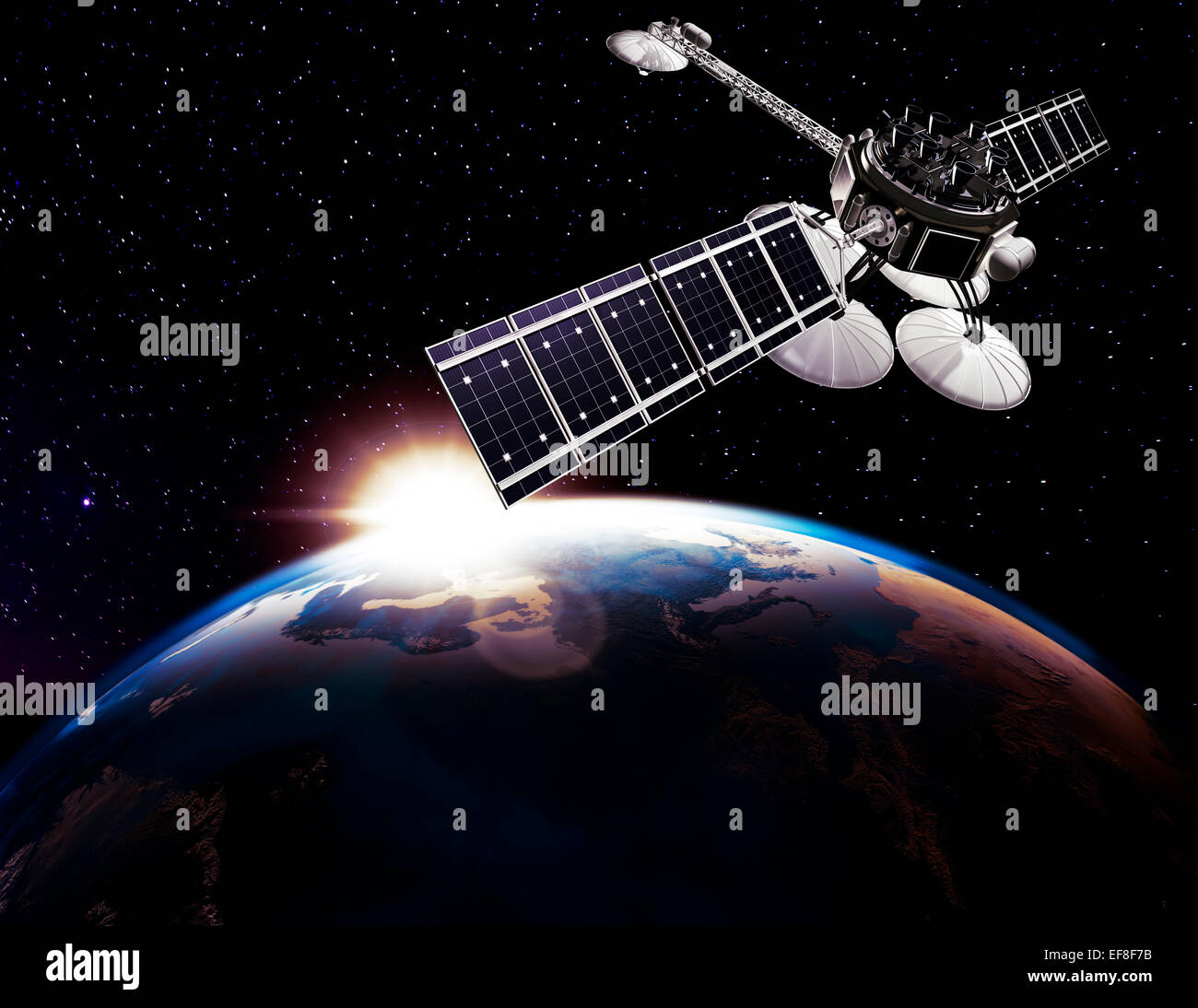 Maximimages.com Communication satellite, Comsat above Earth globe lit by the rising Sun on black starry sky background. Space internet Stock Photo