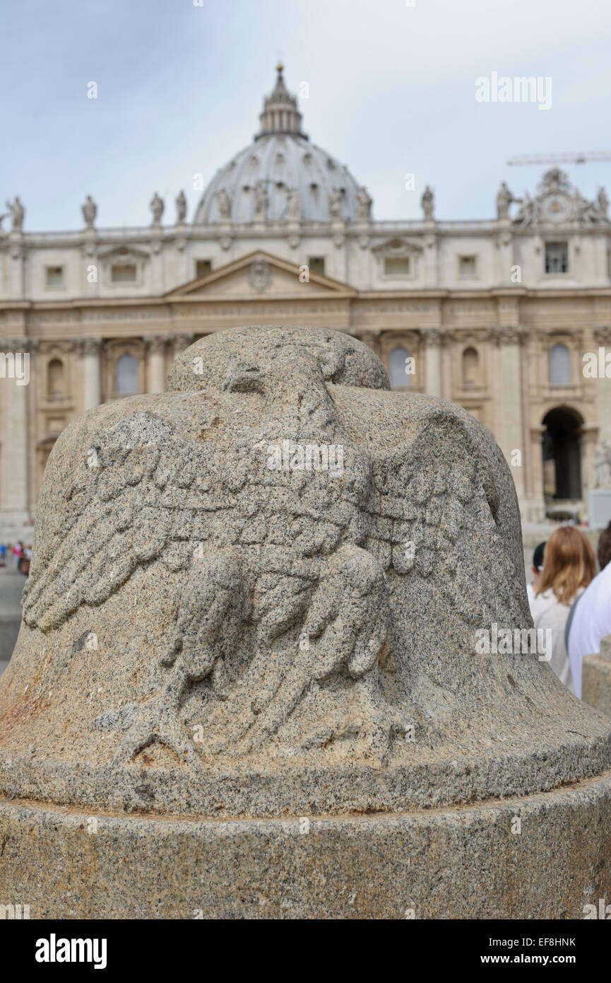 An eagle stone carving in St Peter's square in Vatican City, Rome, Italy. Stock Photo