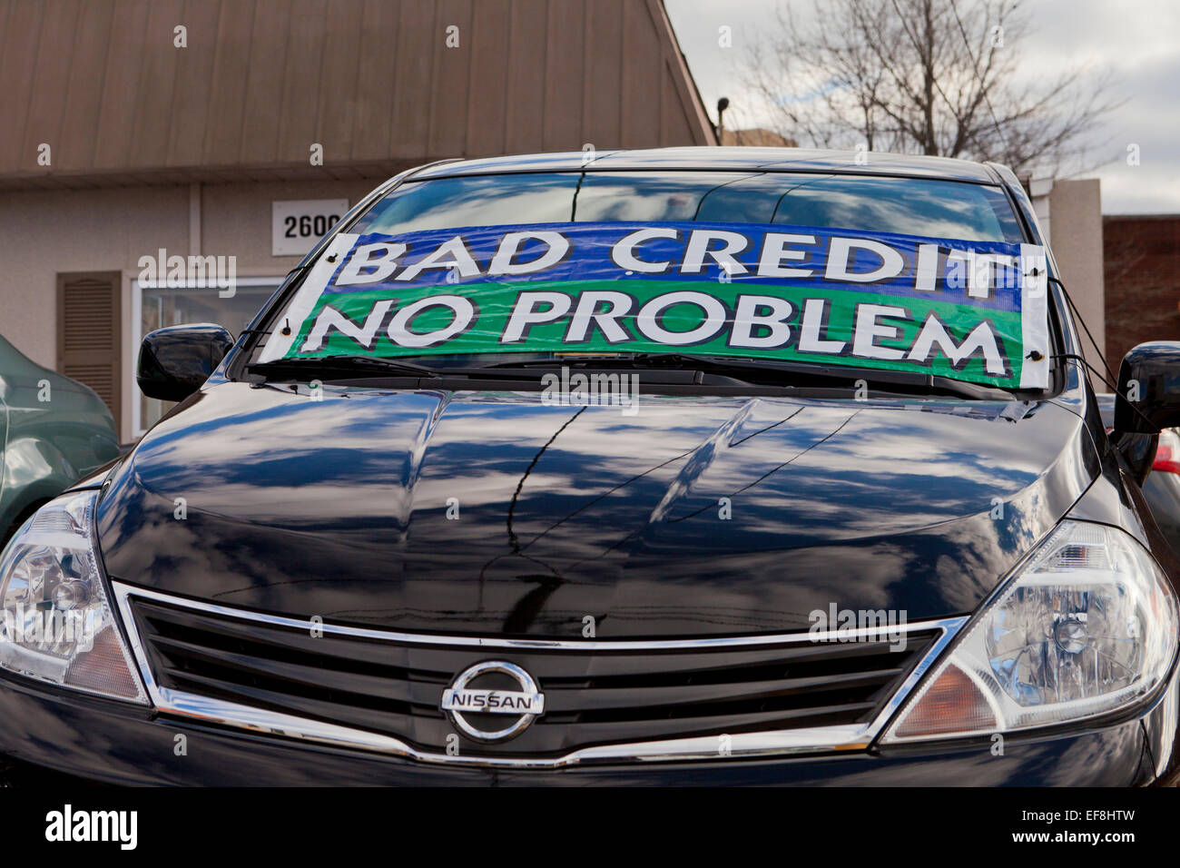 Bad Credit No Problem sign on used car sales lot - USA Stock Photo