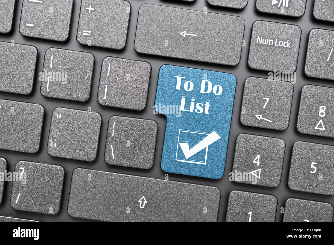 Blue to do list and check mark key on keyboard Stock Photo Alamy