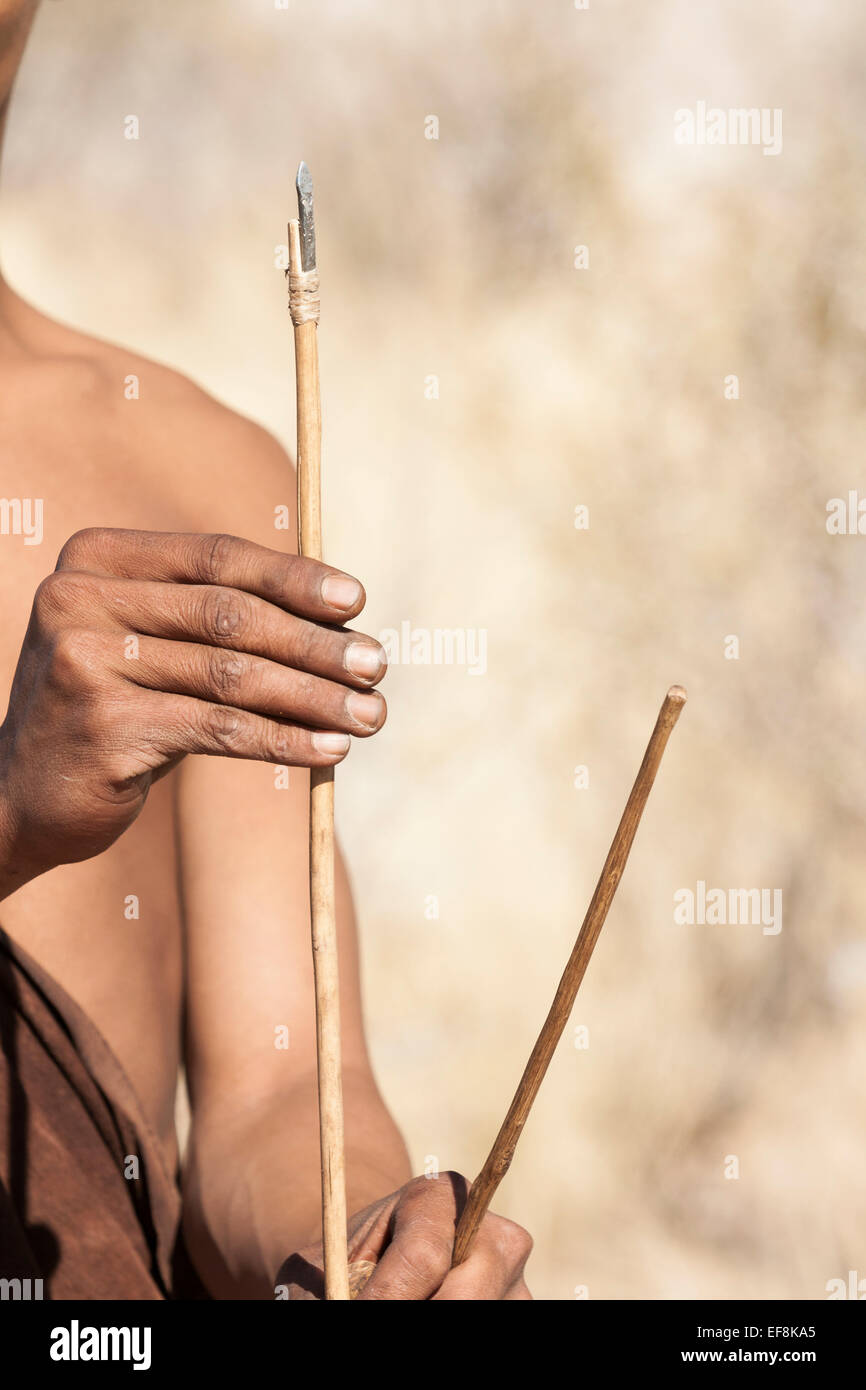 Bushman holds quiver and arrow, Namibia, Africa Stock Photo