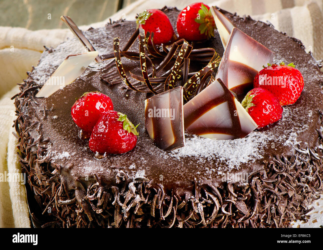 Sweet chocolate cake with berries. Selective focus Stock Photo - Alamy