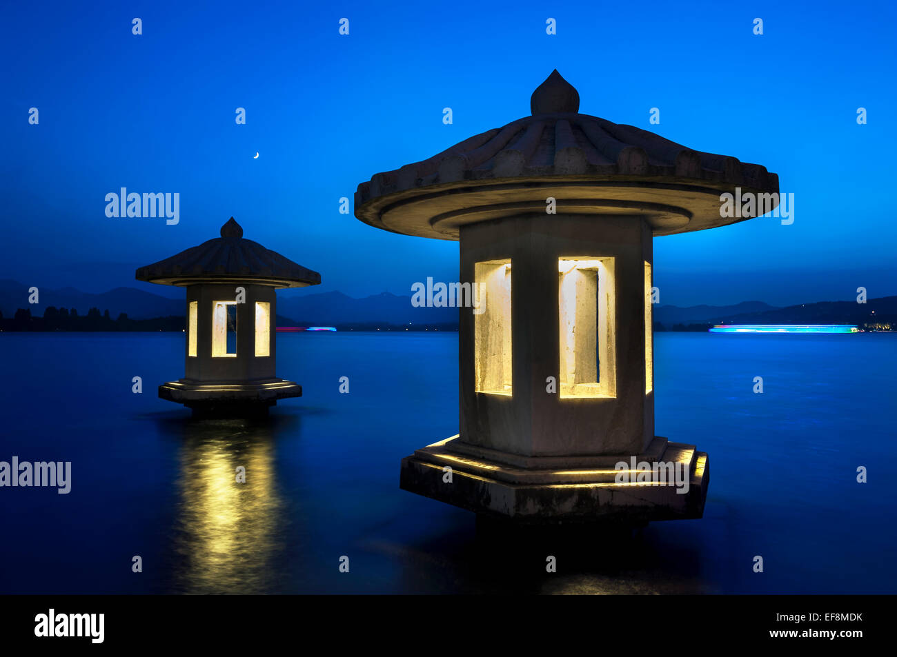 Two lanterns at dusk, West Lake, China Stock Photo