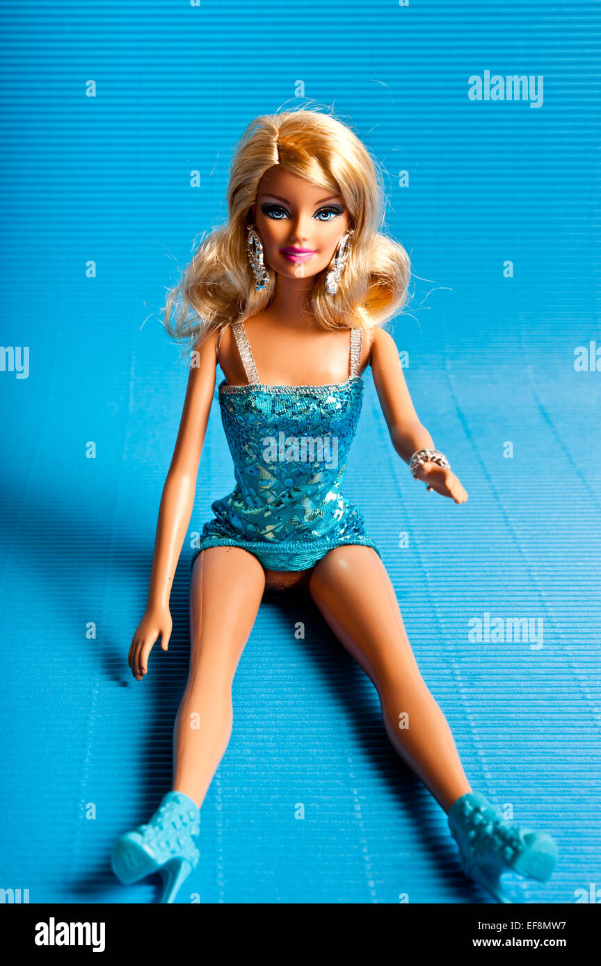 Barbie doll sitting Stock Photo - Alamy