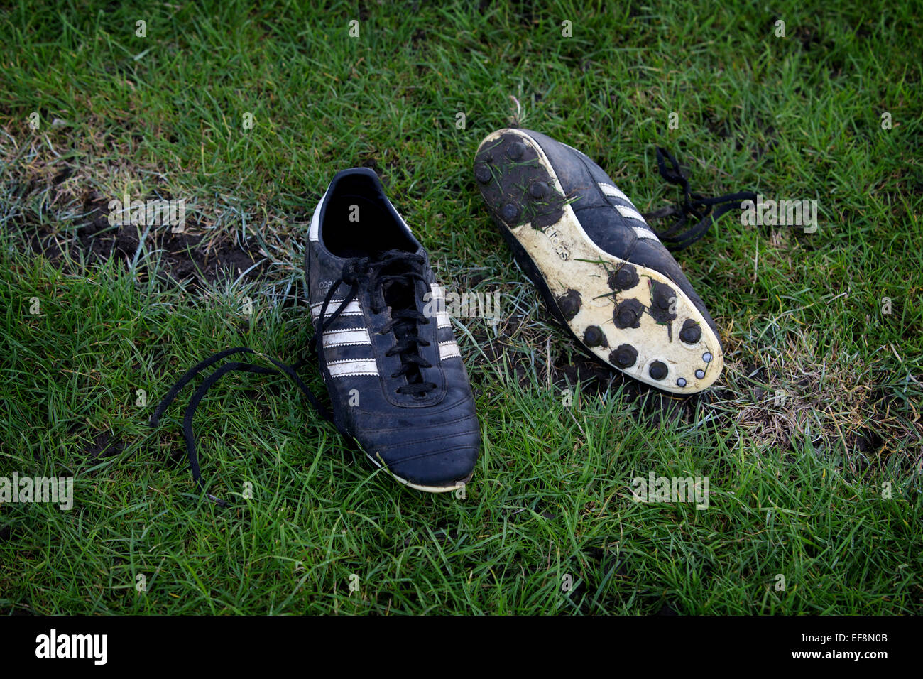muddy football boots
