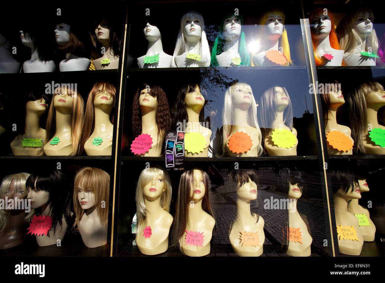 Shop window display of female mannequin heads Stock Photo