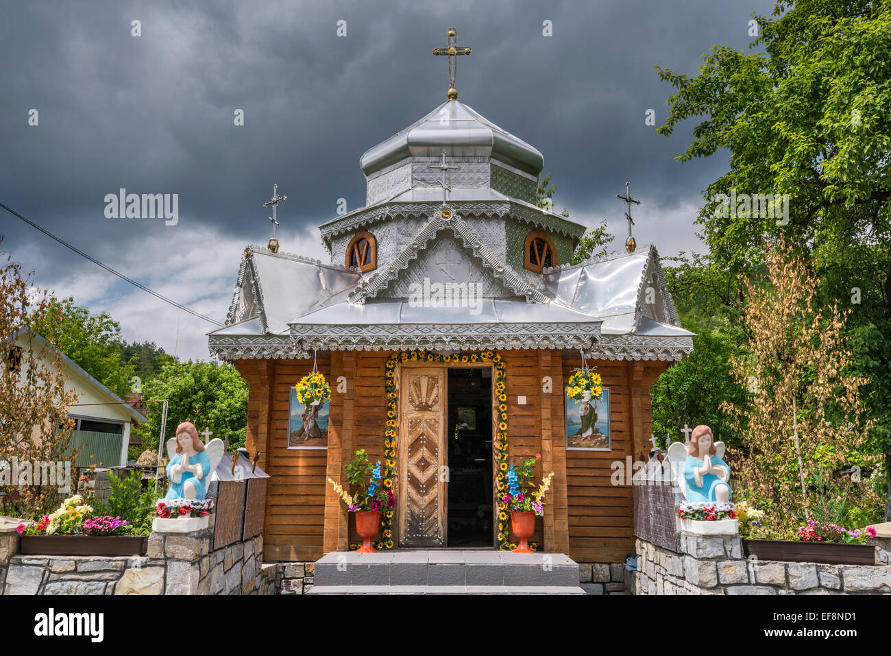 Greek Catholic roadside chapel in village of Sheshory near Kosiv, Carpathian Mountains, Hutsul Region, Prykarpattia, Ukraine Stock Photo