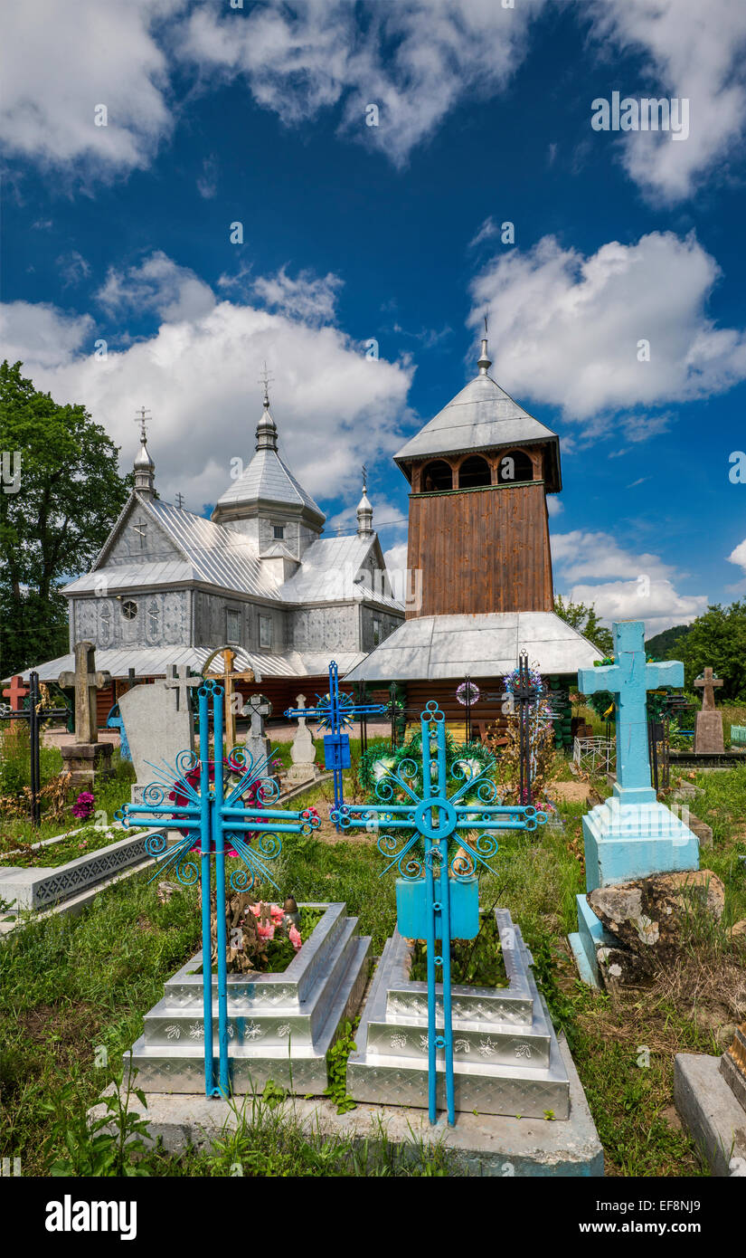 Greek Catholic church, cemetery in village of Sheshory near Kosiv, Carpathian Mountains, Hutsul Region, Prykarpattia, Ukraine Stock Photo