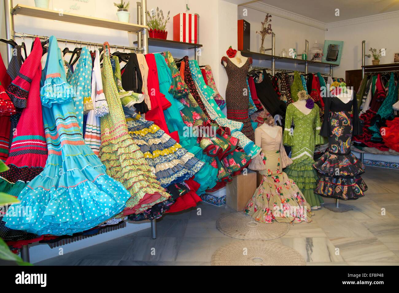Flamenco dresses in a store, El Rocio, El Rocio, Costa de la Luz, Andalusia, Spain Stock Photo