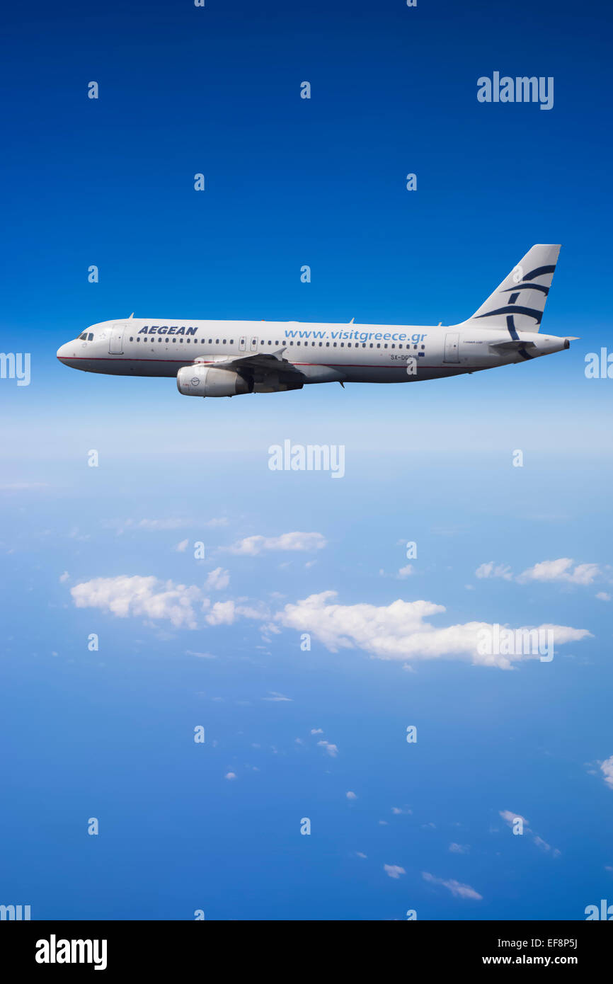 SX-DGD Aegean Airlines Airbus A320-232 in flight over the Mediterranean Sea Stock Photo