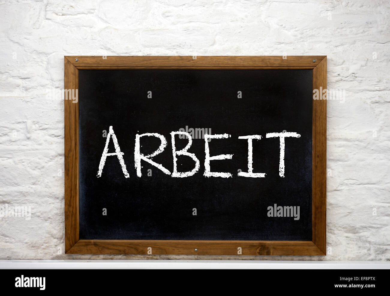 Chalkboard with the word "Arbeit", German for work Stock Photo Alamy
