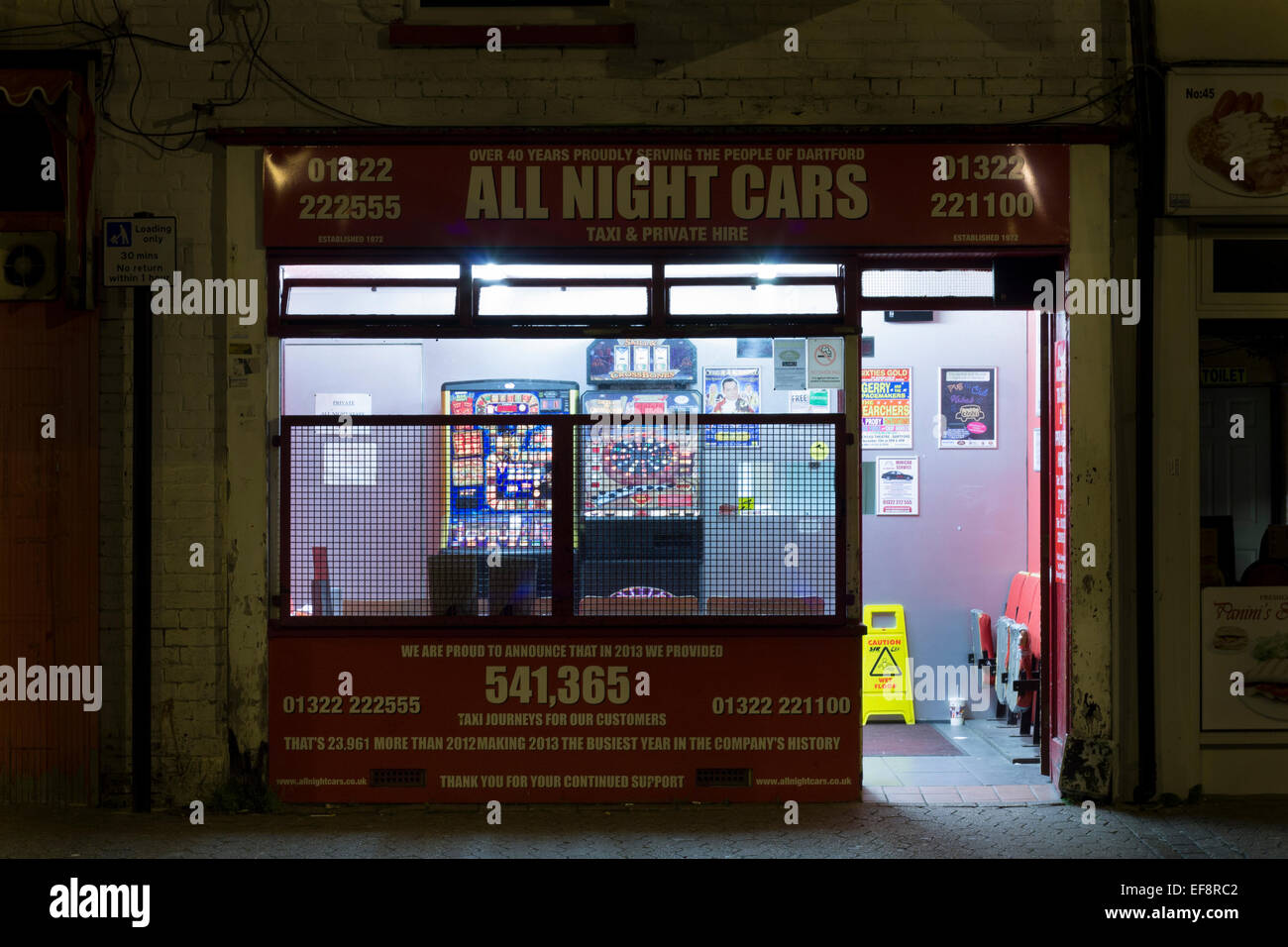 Empty taxi rank at night Stock Photo