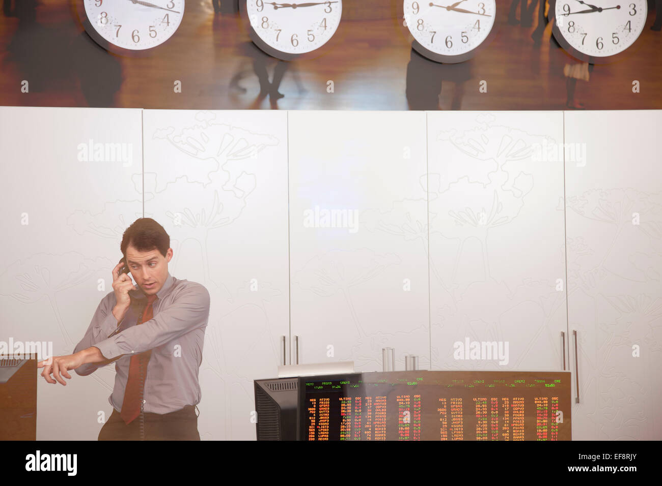 Trader working in trading room Stock Photo Alamy