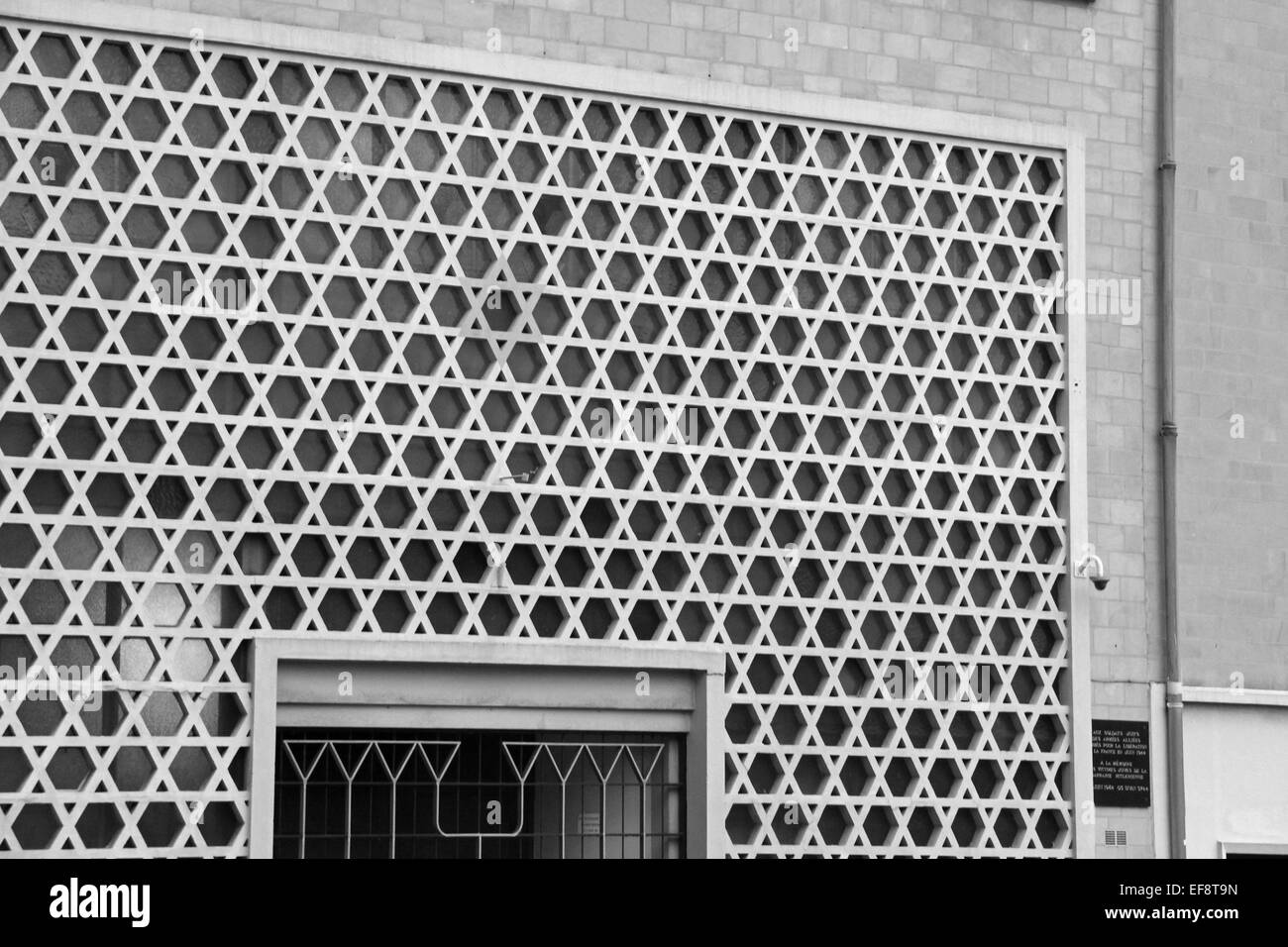 The facade of a synagogue located in Caen, France, was decorated with sculptured stars of David. Stock Photo
