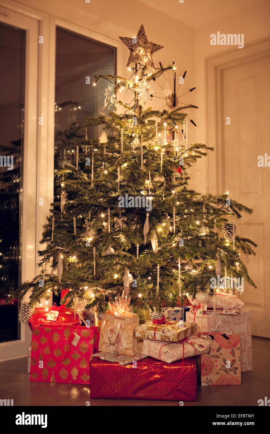 Christmas tree with red and gold presents Stock Photo