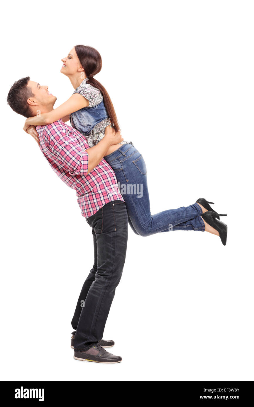 Cheerful Man Carrying Girlfriend Piggyback At Home Shaping Heart With His  Hands High-Res Stock Photo - Getty Images