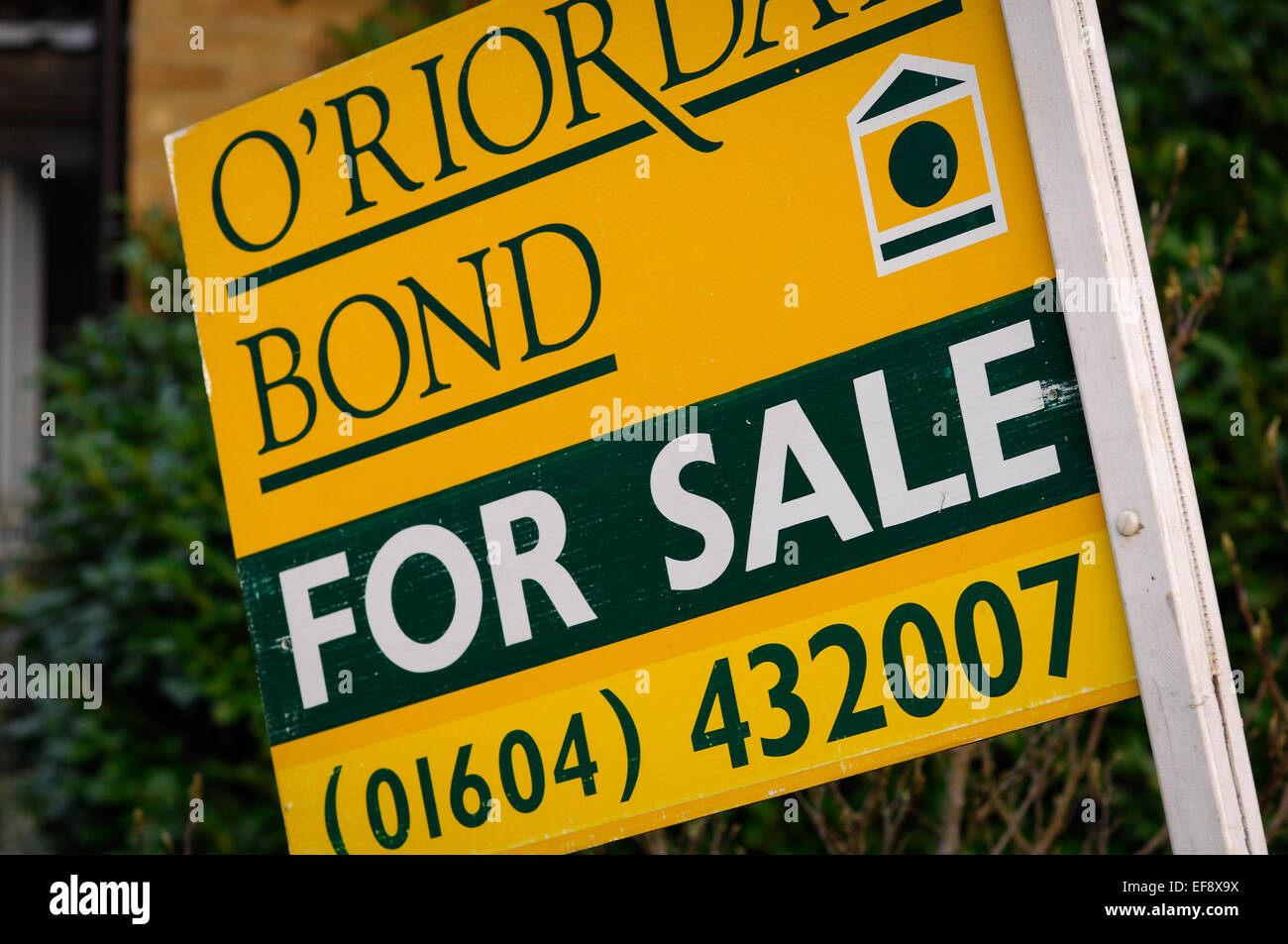 House for sale sign Stock Photo