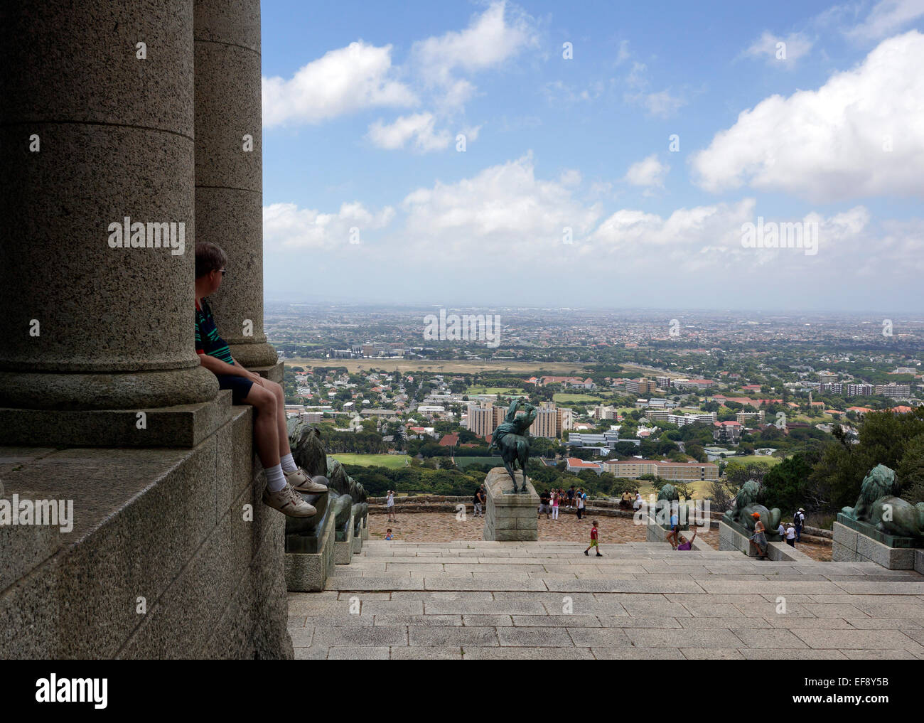 Tourists taking in the view from Rhodes Memorial on the lower slopes of Devil's Peak in Cape Town, South Africa. Stock Photo
