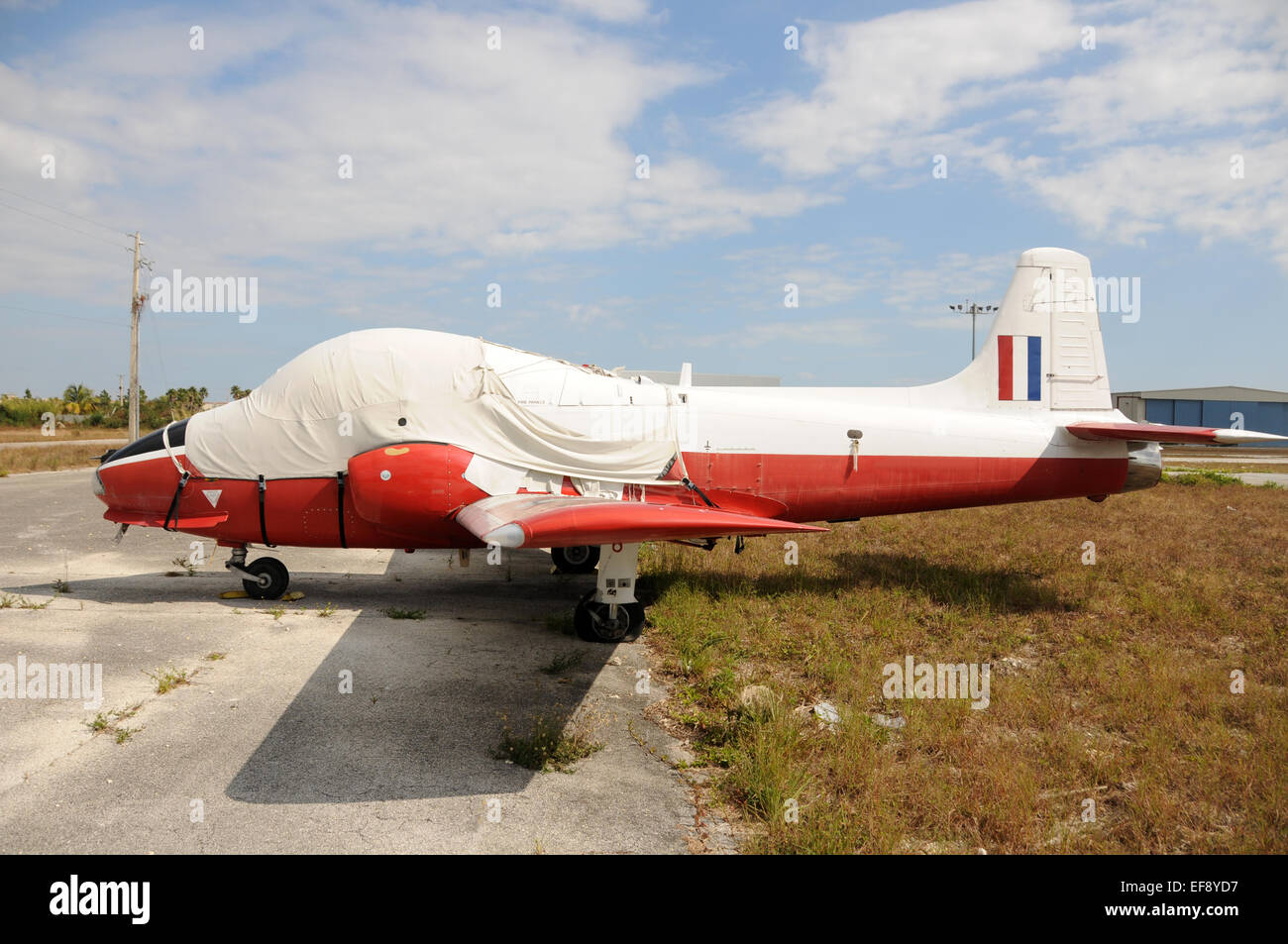Old military jet airplane abandoned on a field Stock Photo - Alamy