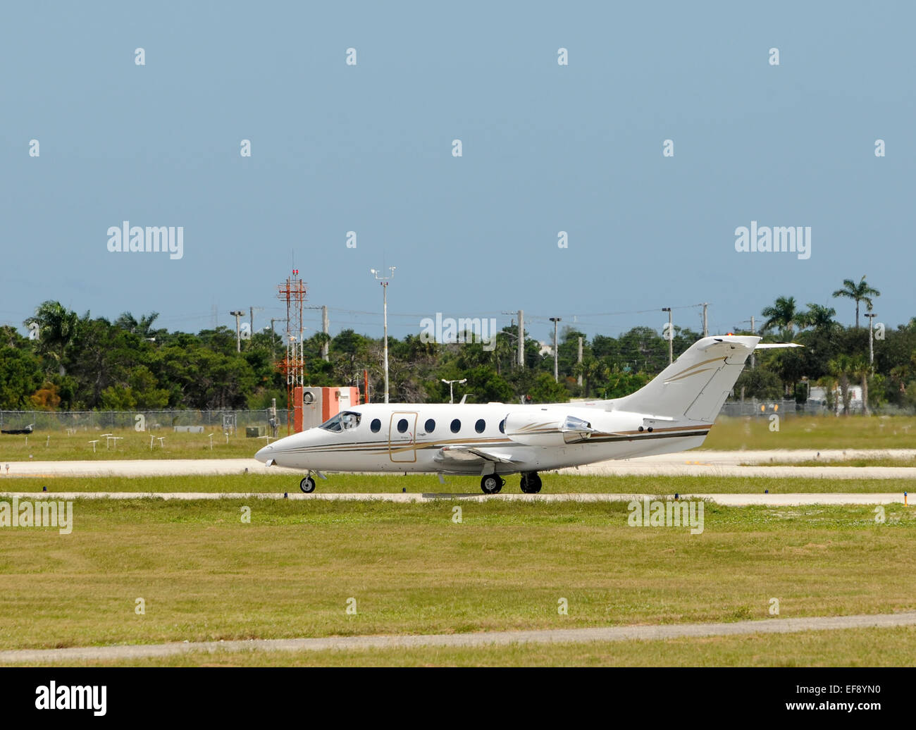 Light private jet airplane for charter service Stock Photo Alamy