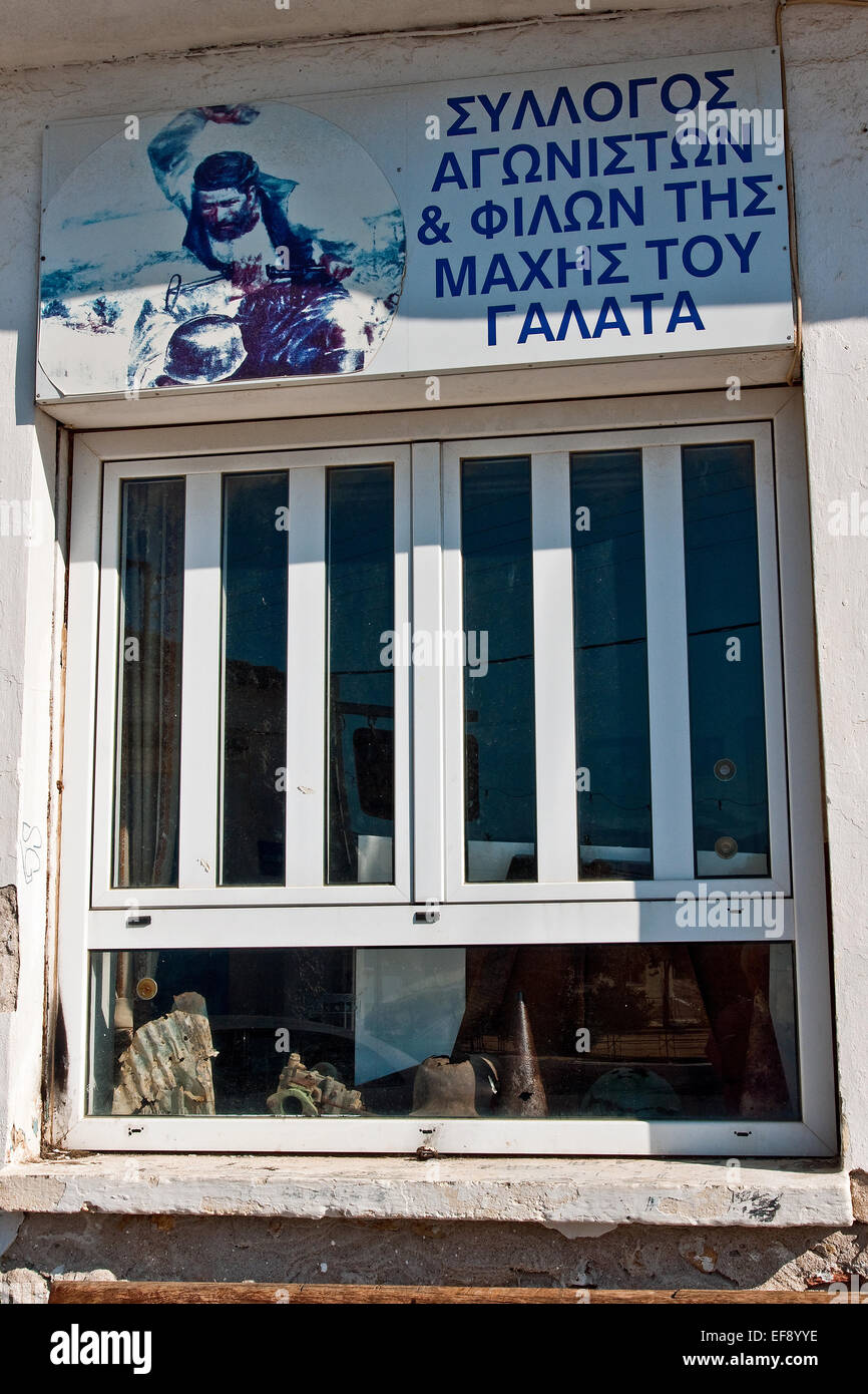 Window in Galatas, Crete, scene of bitter fighting during the Battle of Crete, with  sign and wartime relics Stock Photo
