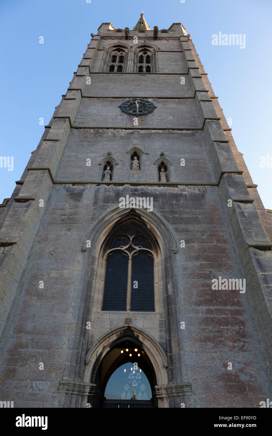 Entrance doorway and front facade of the church of All Saints, Oakham, Rutland, England. The church dates from the 14th century. Stock Photo