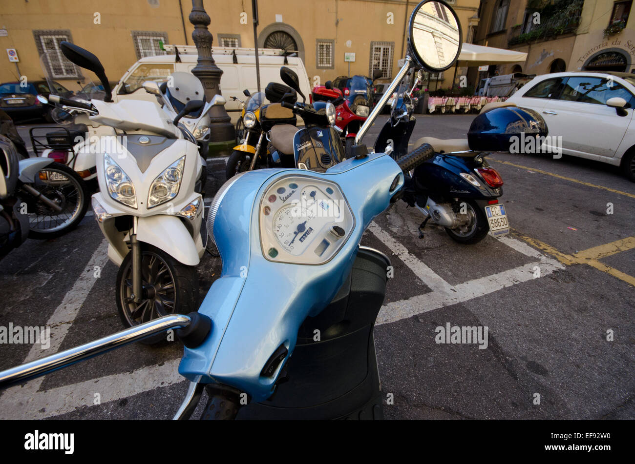 View of scooters and motorbikes in Lucca, Tuscany, Italy Stock Photo