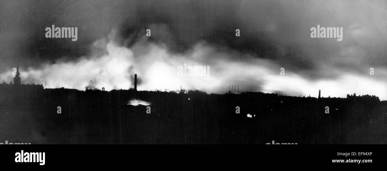 The burning city of Dresden after the bombing attacks by the Allies, the British Royal Airforce and the United States Army Air Forces, in the night between 13 February and 14 February 1945. The picture was taken at the Waltherstraße in Dresden looking at the Ostragehege. At the end of the war in May 1945, one third of all apartments in Dresden were destroyed. According to recent historical investigations 25,000 people were killed by the air raids. Fotoarchiv für Zeitgeschichte - NO WIRE SERVICE Stock Photo