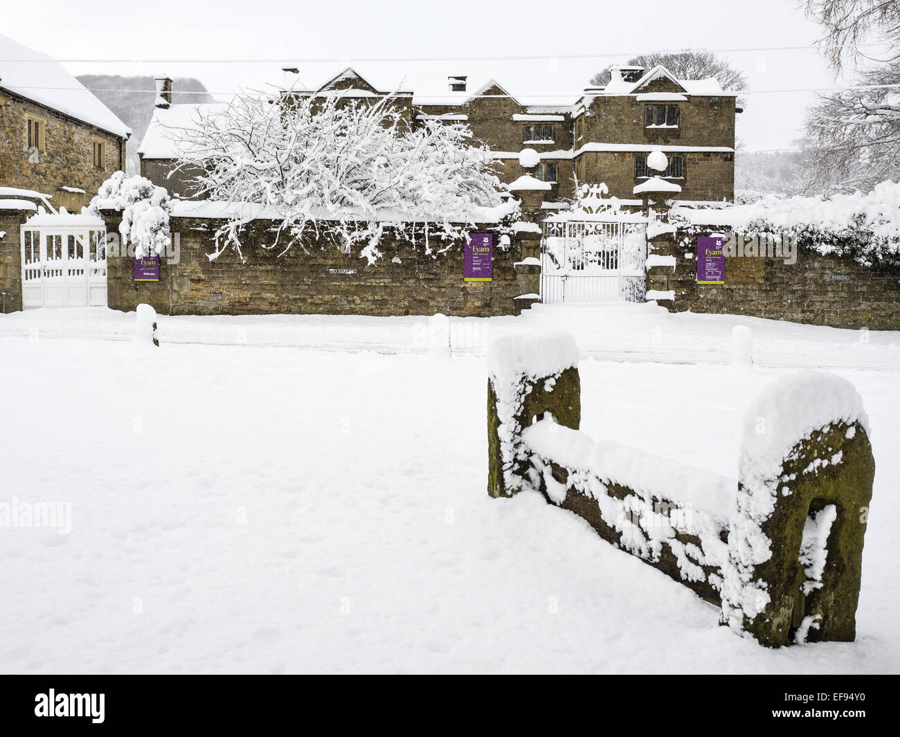 Eyam, Derbyshire, UK. 29th January, 2015. UK Weather: Village stocks are covered in snow outside Eyam Hall. Credit:  Paul Griffiths/Alamy Live News Stock Photo
